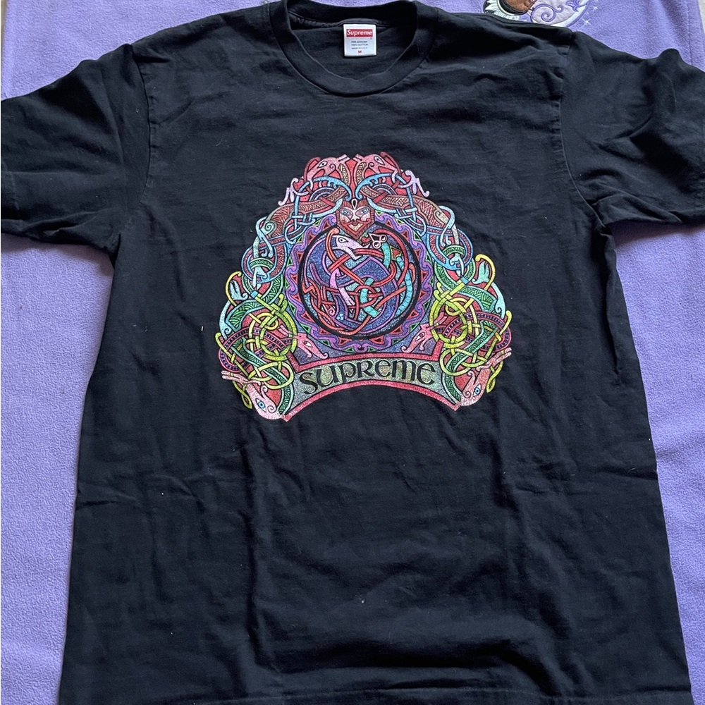 Black and multi colored supreme t shirt